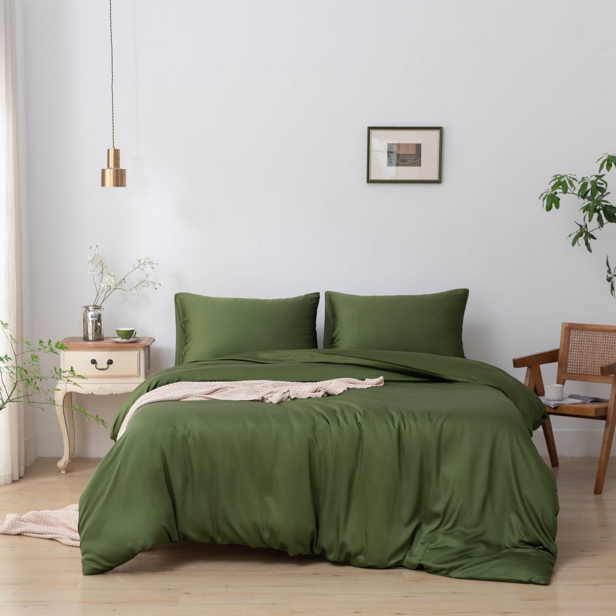 Deep Moss bamboo bedding set on a made bed
