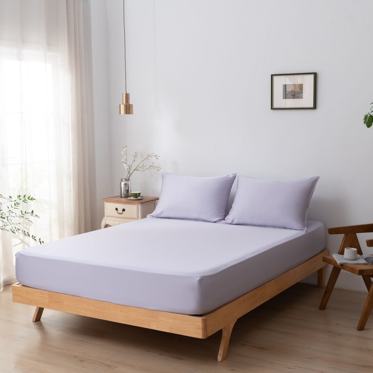 Lavender Mist bamboo bedding set on a bed, wide bedroom view