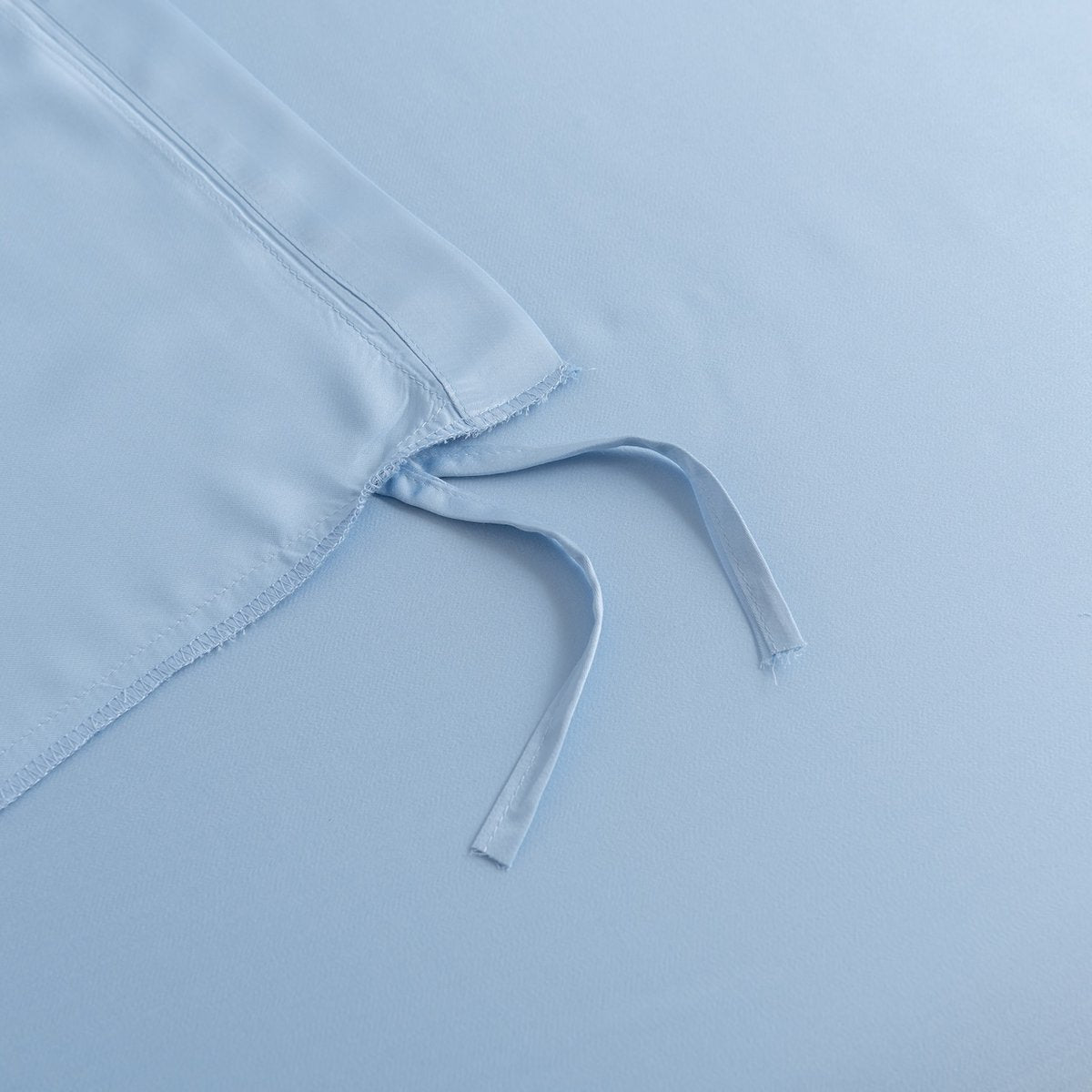 Folded Sky Blue bamboo fabric showing its natural sheen