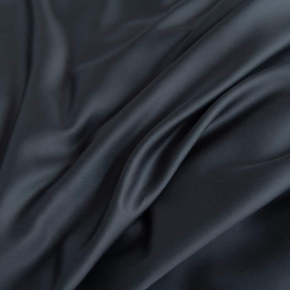 Close-up of the soft, silky weave of the Space Blue bamboo fabric