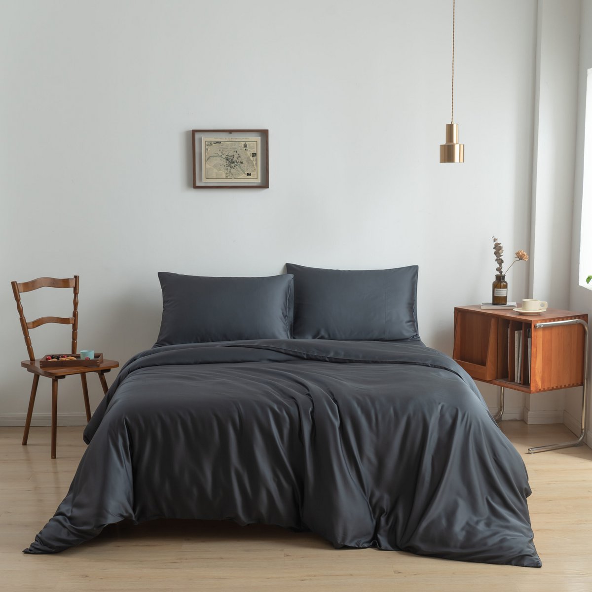 Close-up of a handmade bamboo button and buttonhole closure on the Space Blue bamboo duvet cover