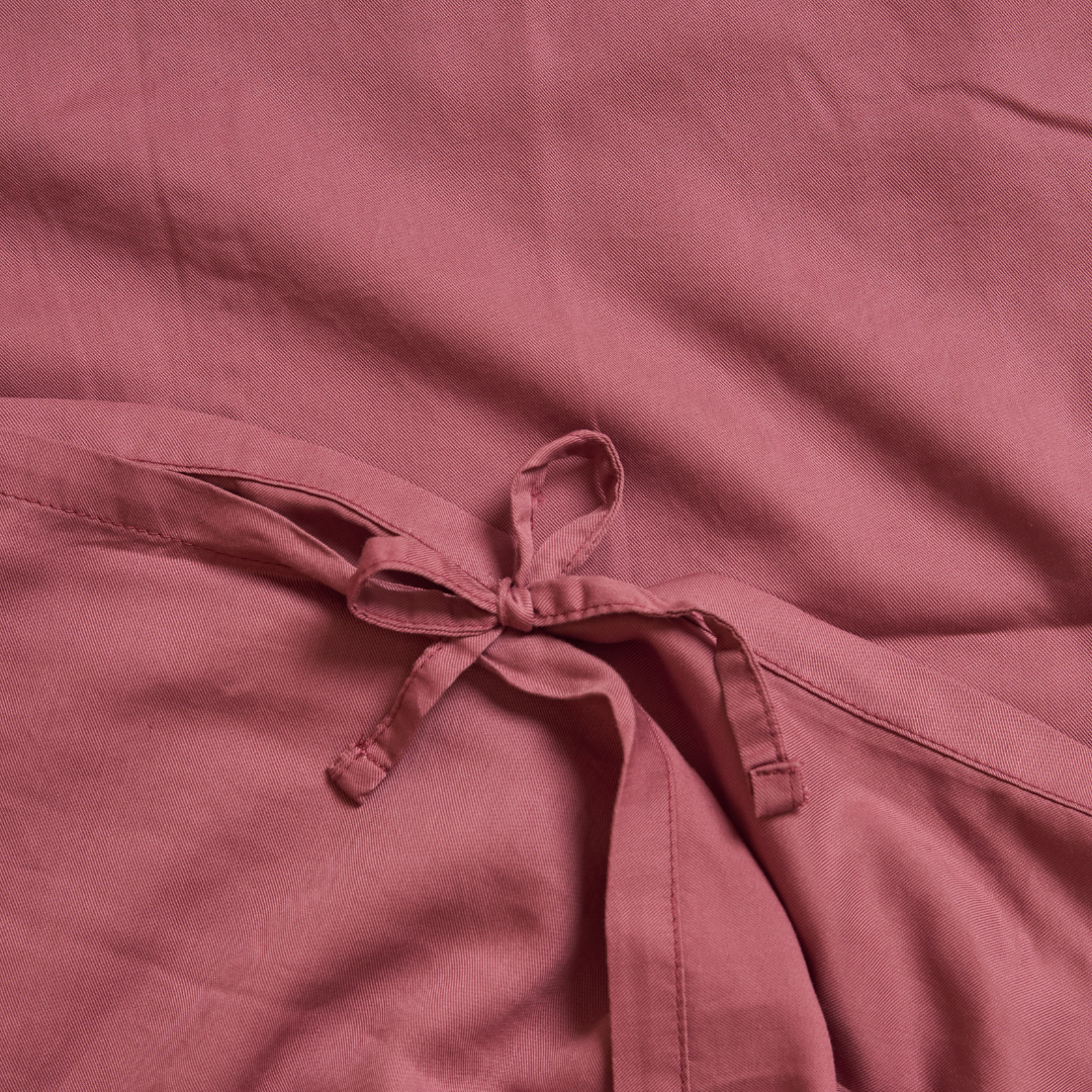 Close-up of the Tencel™ Twill fabric gathered in Dusty Rose