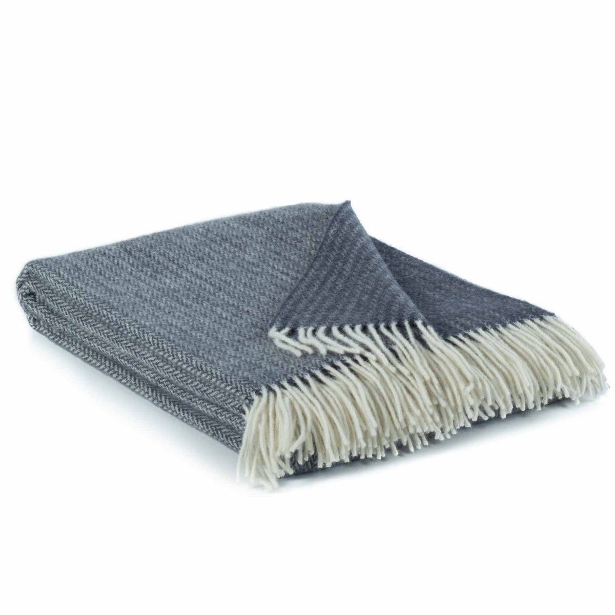 Wool Throw Blanket Sienna in blue styled on a surface