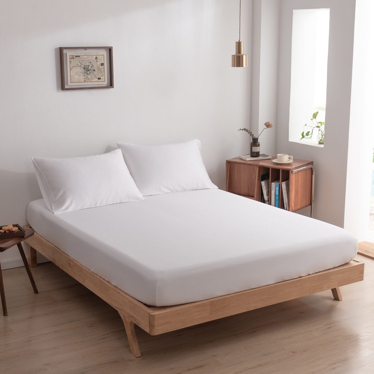 Coco White bamboo bedding set styled on a made bed