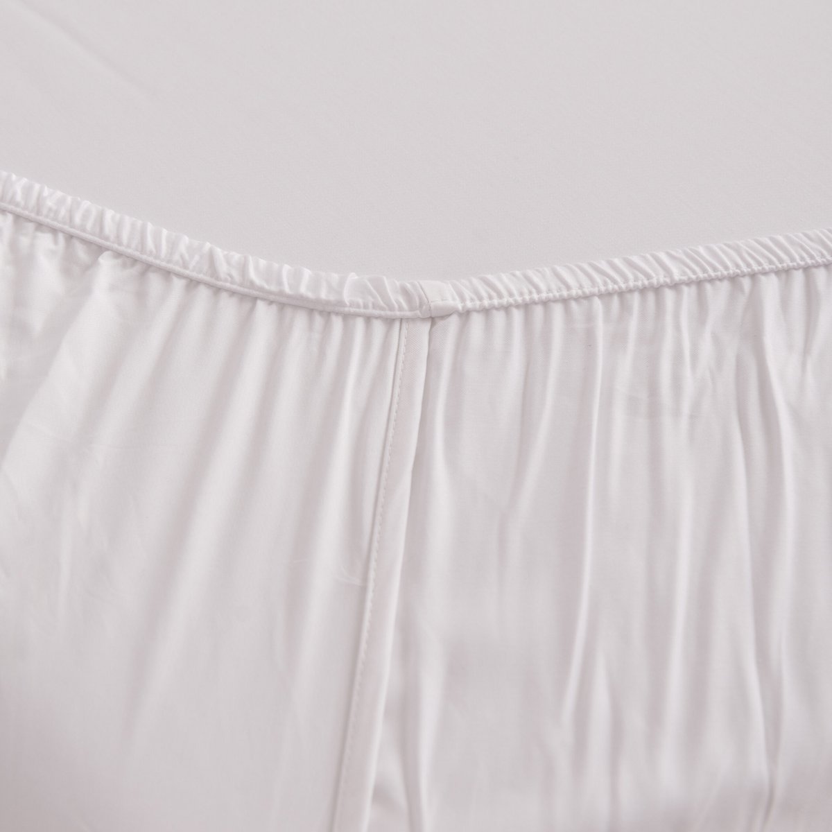 Close-up of gathered Coco White bamboo fabric