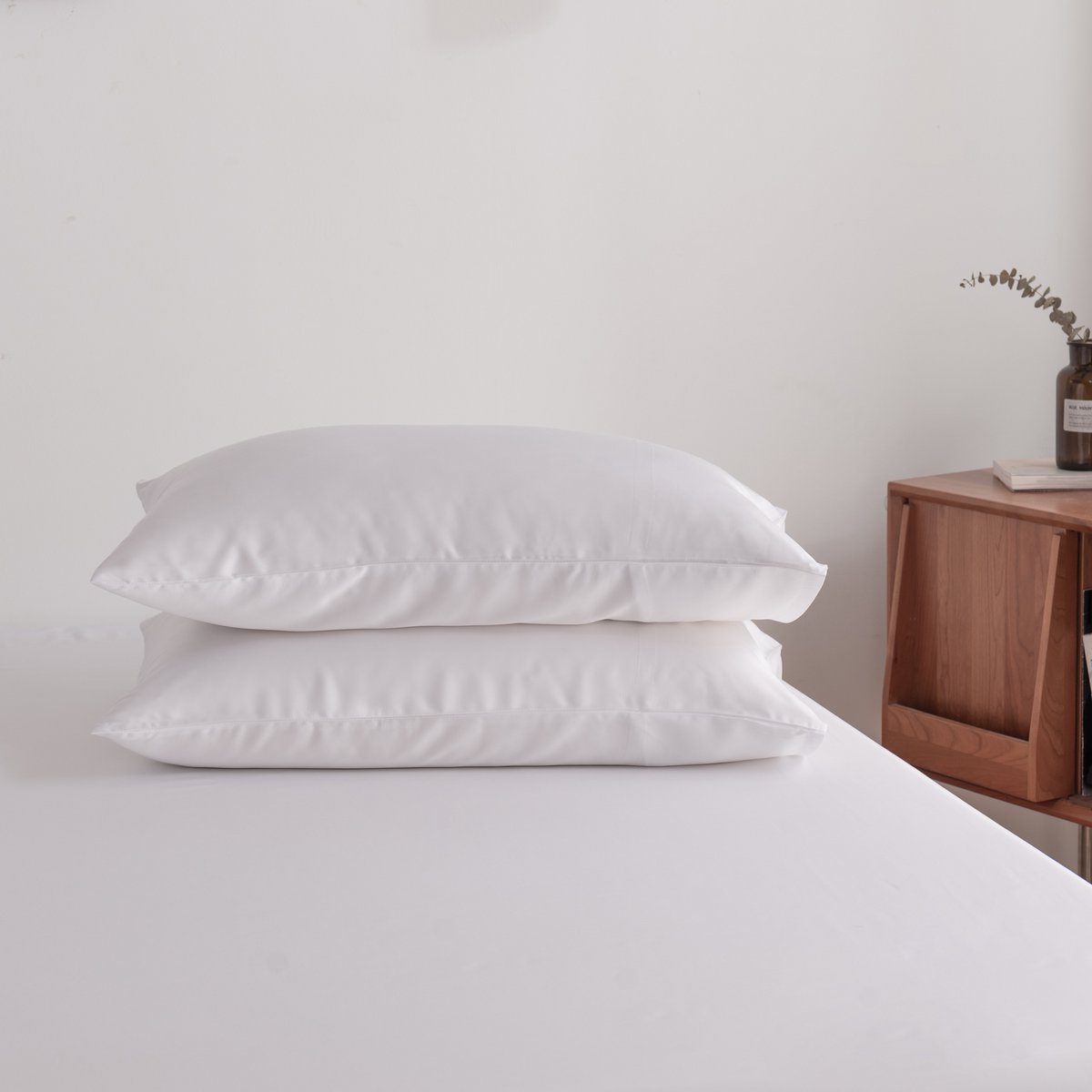 Folded stack of Coco White bamboo bed linen