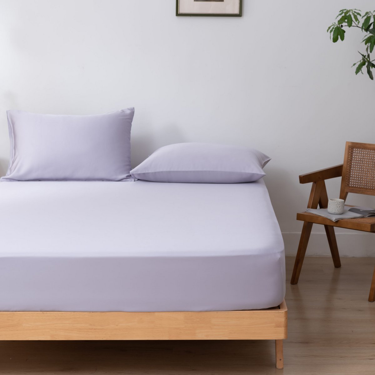 Lavender Mist bamboo pillowcases styled on a chair
