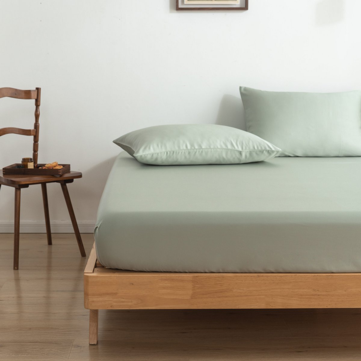 Foot-of-bed view of the Sage Green bamboo bedding set