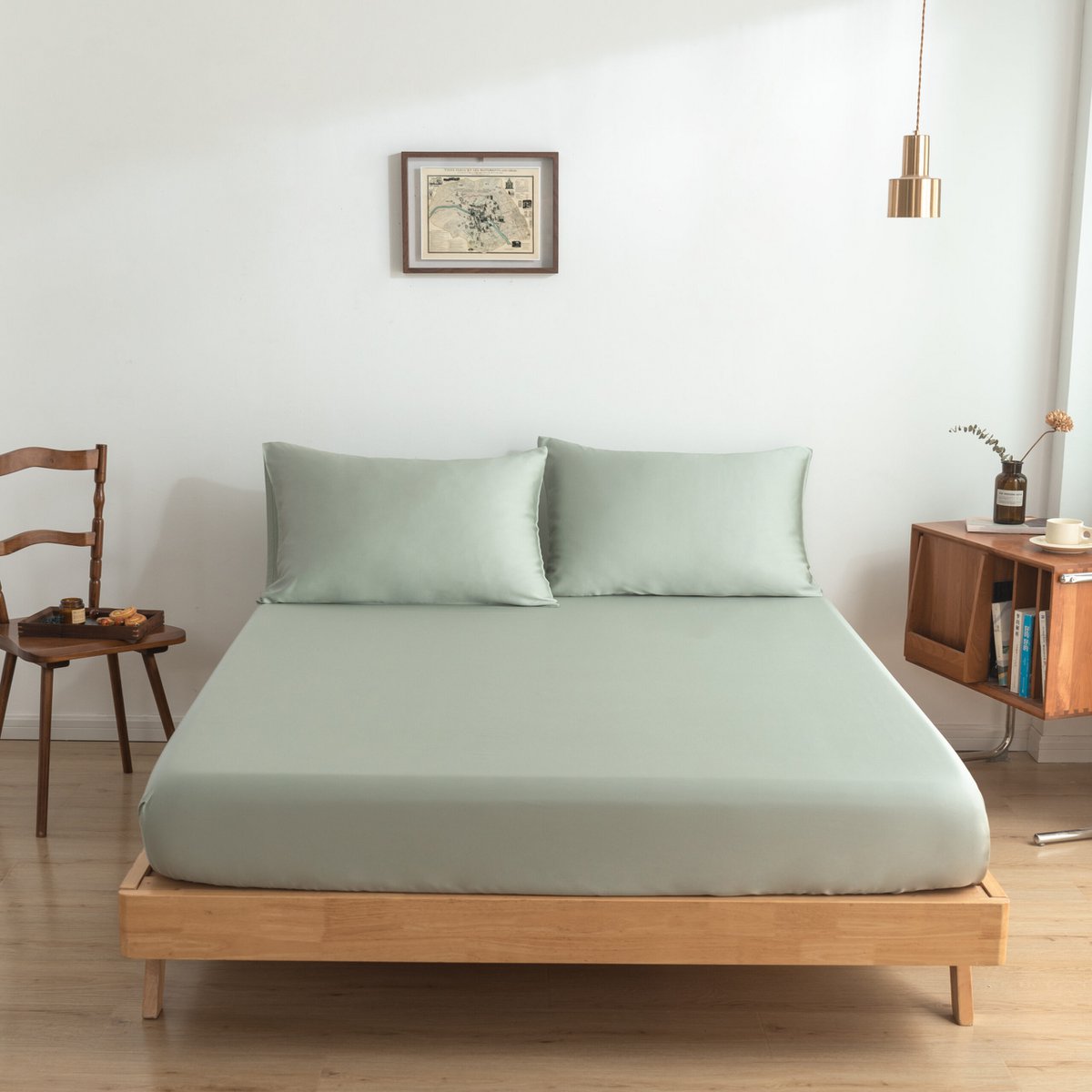 Sage Green bamboo bedding set on a bed front view