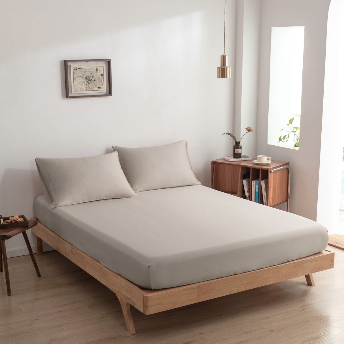 Soft Taupe bamboo bedding set on a made bed, wide view