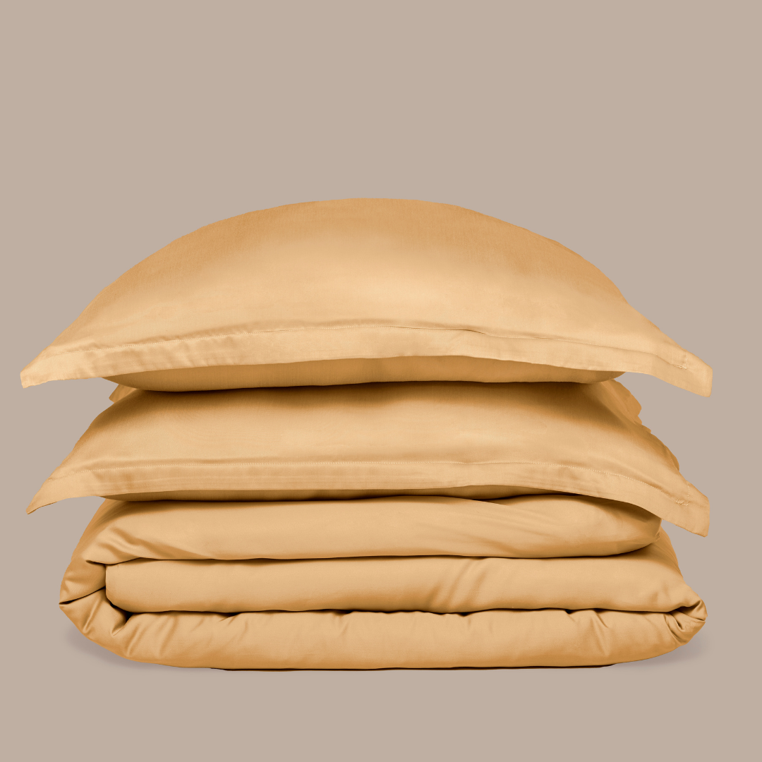 Bamboo Duvet Cover and pillowcases in Ocher Yellow, folded