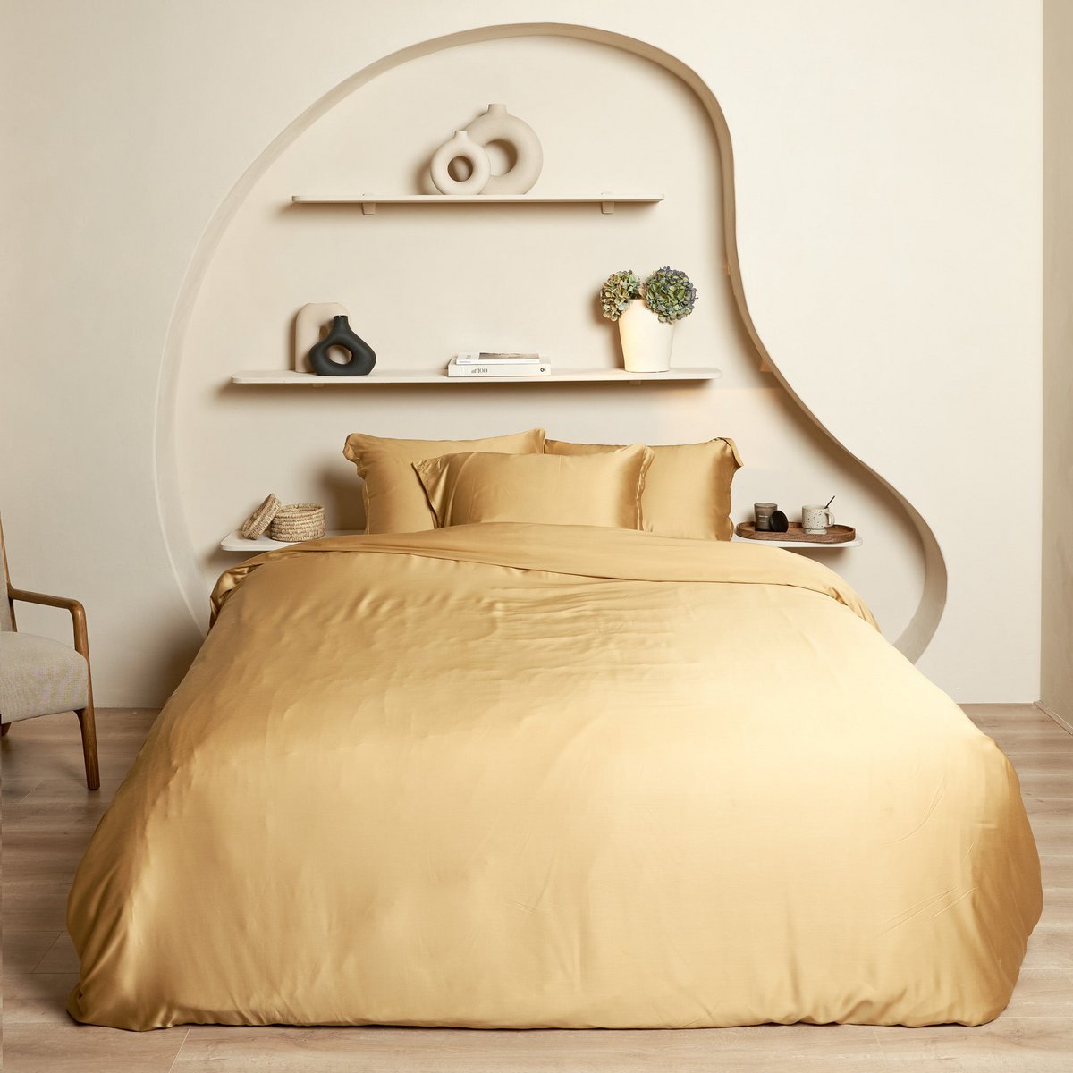Bamboo Duvet Cover in Ocher Yellow styled on a bed with an arched headboard