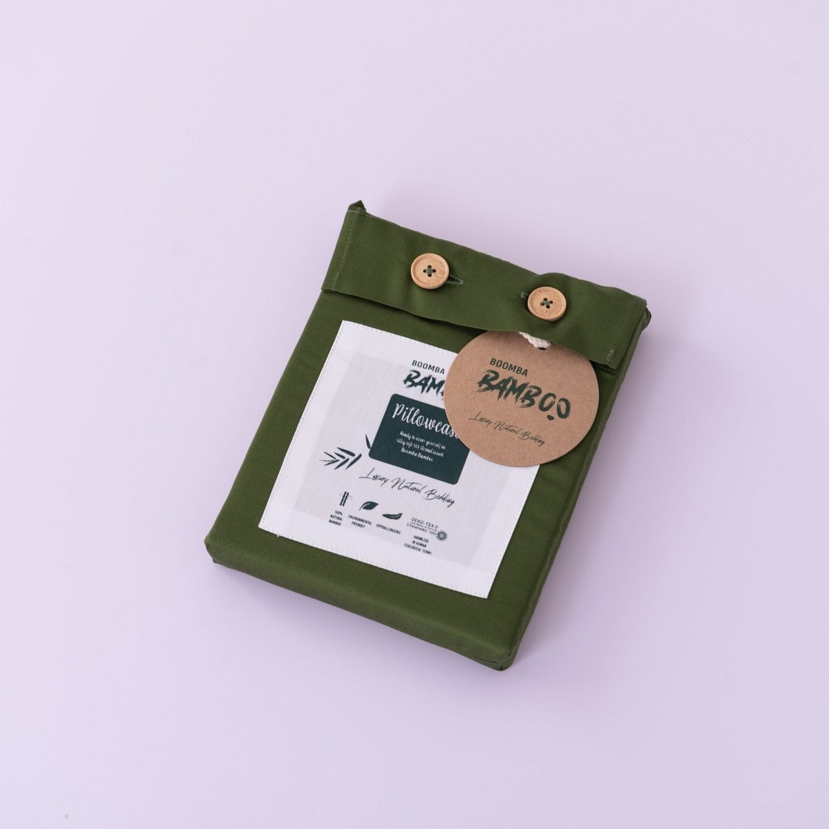 Deep Moss bamboo pillowcases shown with their packaging