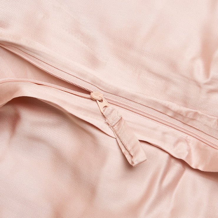 Close-up of the closure detail on the Eco Bamboo Duvet Cover in Powder Peach with a zipper