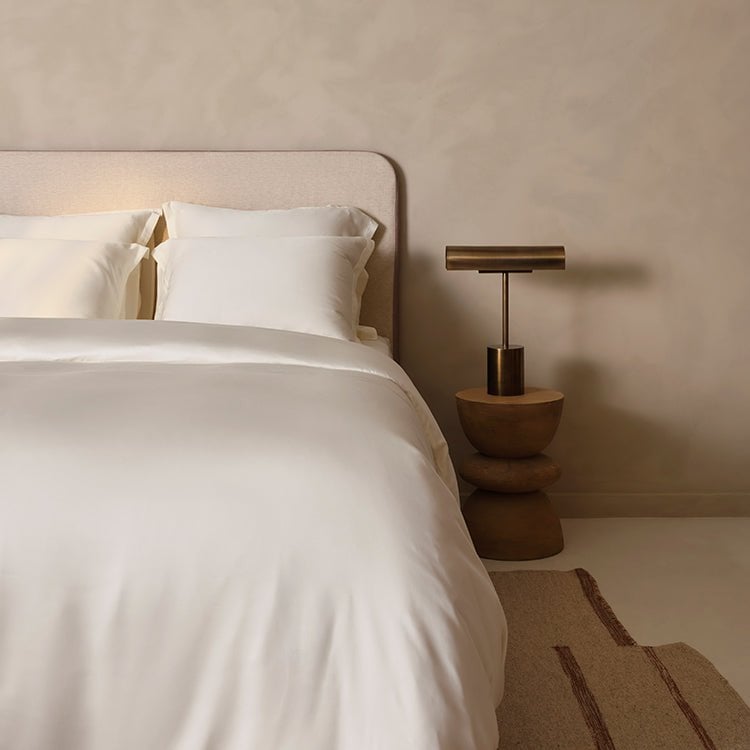 Tencel™ Sateen Duvet Cover in Off White styled on a bed