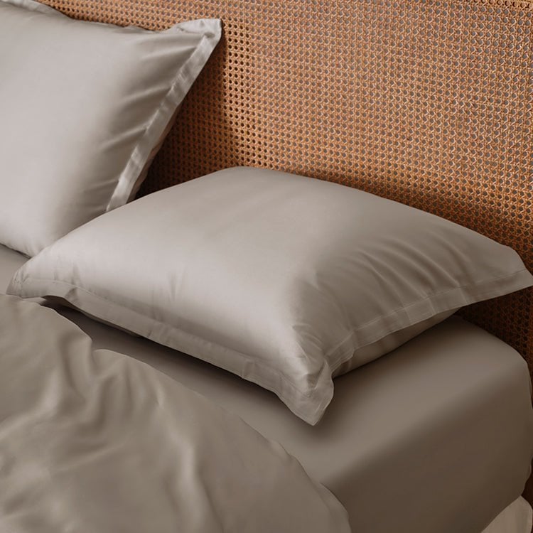 Close-up of pillows in the Tencel™ Sateen Duvet Cover set in Taupe