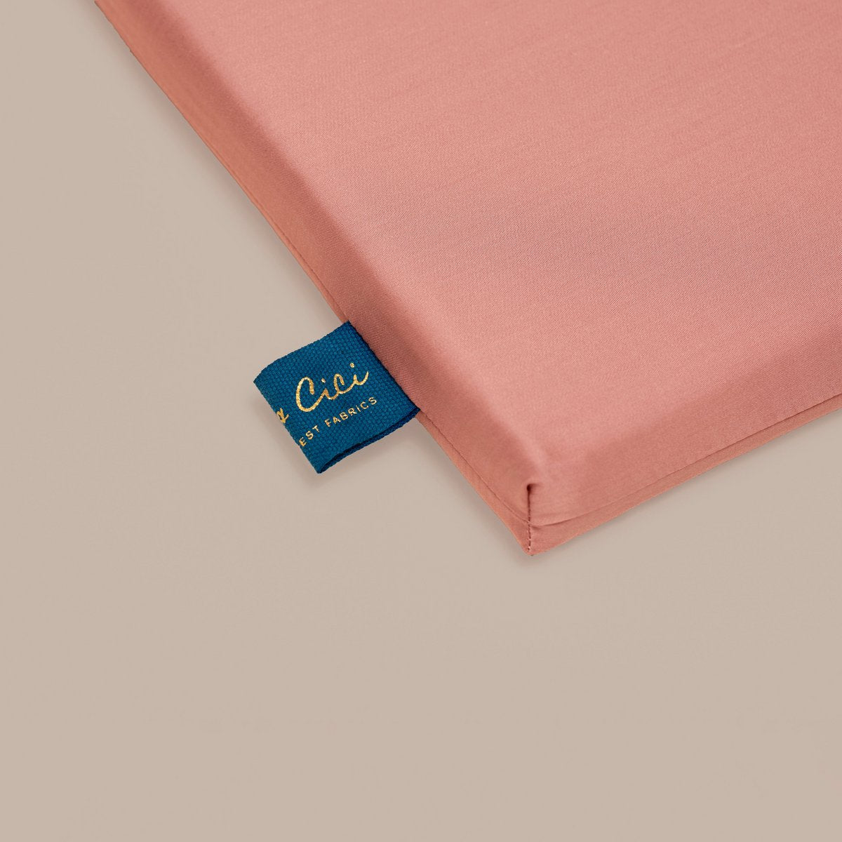Close-up of the product label on the Tencel™ Sateen Duvet Cover in Terra Pink