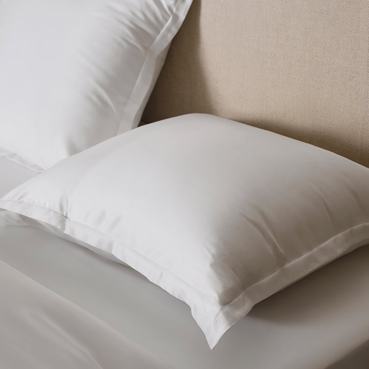 Close-up of pillows in the Tencel™ Sateen Duvet Cover set in White