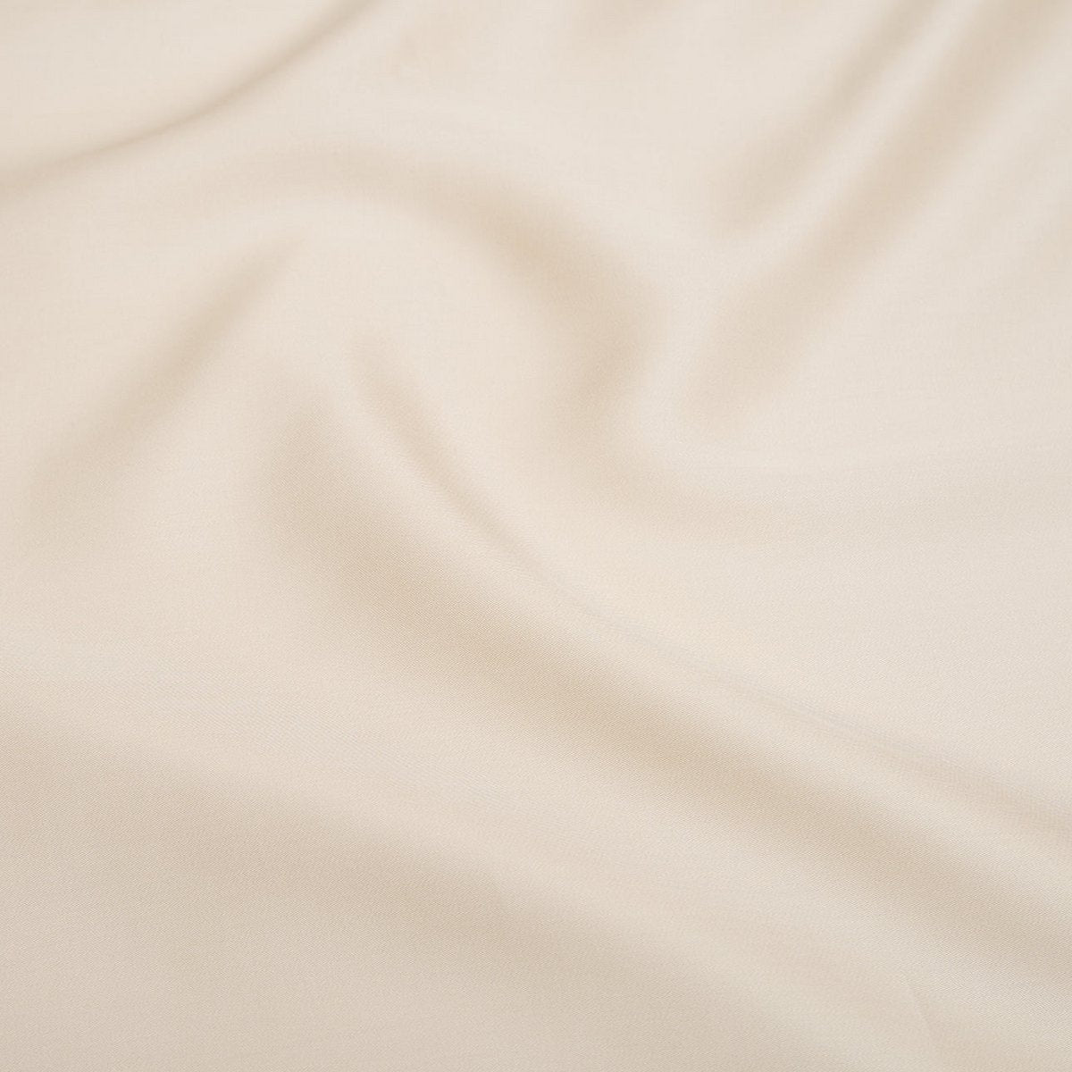 Close-up of the Tencel™ Sateen Pillowcase in White Sand fabric texture