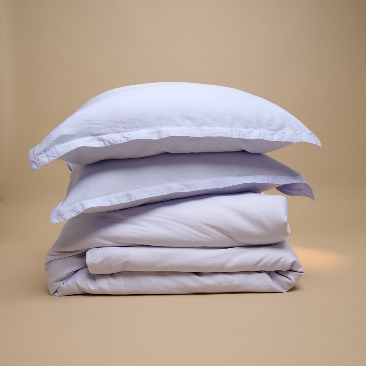 Tencel™ Twill Duvet Cover and pillows in Lavender Blue, folded