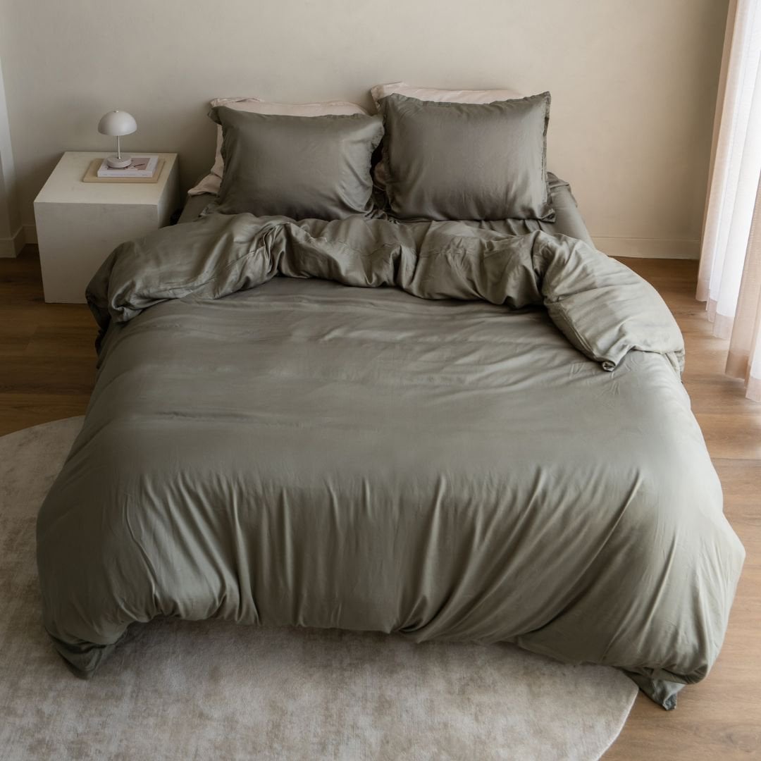 Tencel™ Twill Duvet Cover in Olive Green styled on a bed