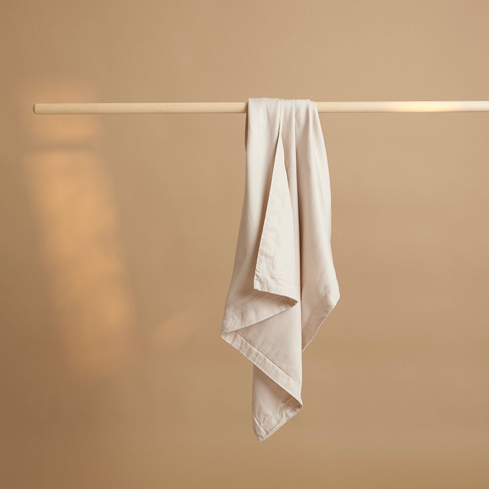 Tencel™ Twill Pillowcase fabric in Beige, draped detail