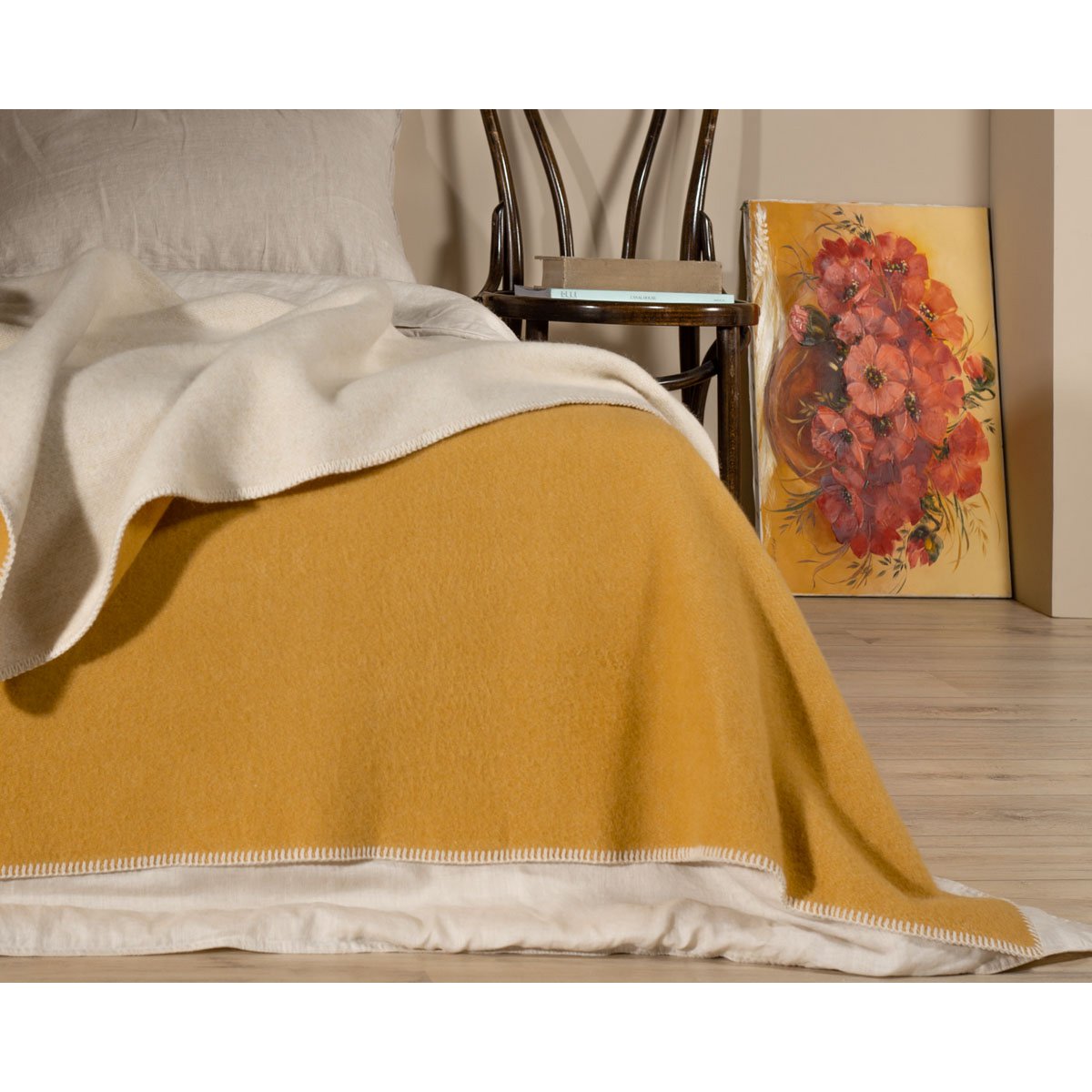 Close-up of the Misted Yellow bedspread's dense 450g/m² wool weave