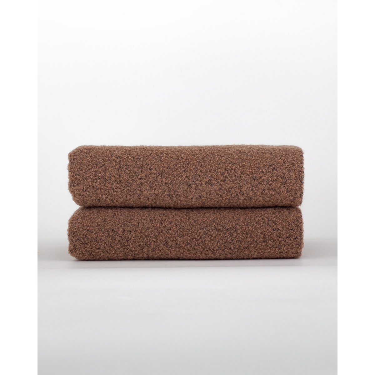 Close-up of Paris throw's brown bouclé texture