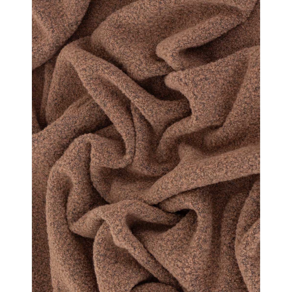 Wool Bouclé Throw Blanket Paris in brown styled in a room setting