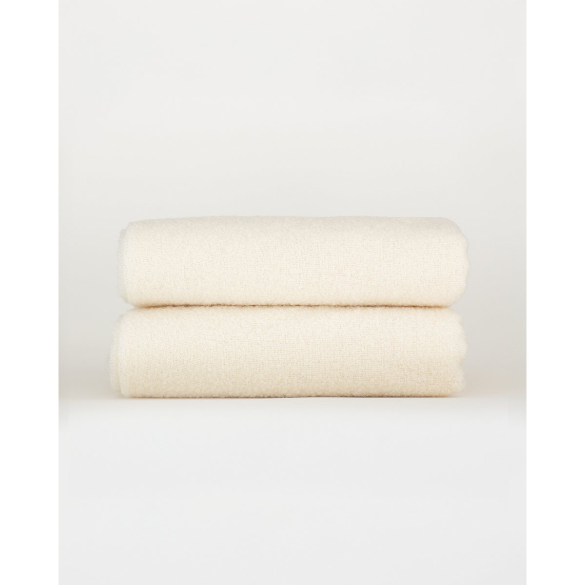 Close-up of Paris throw's bouclé texture in white