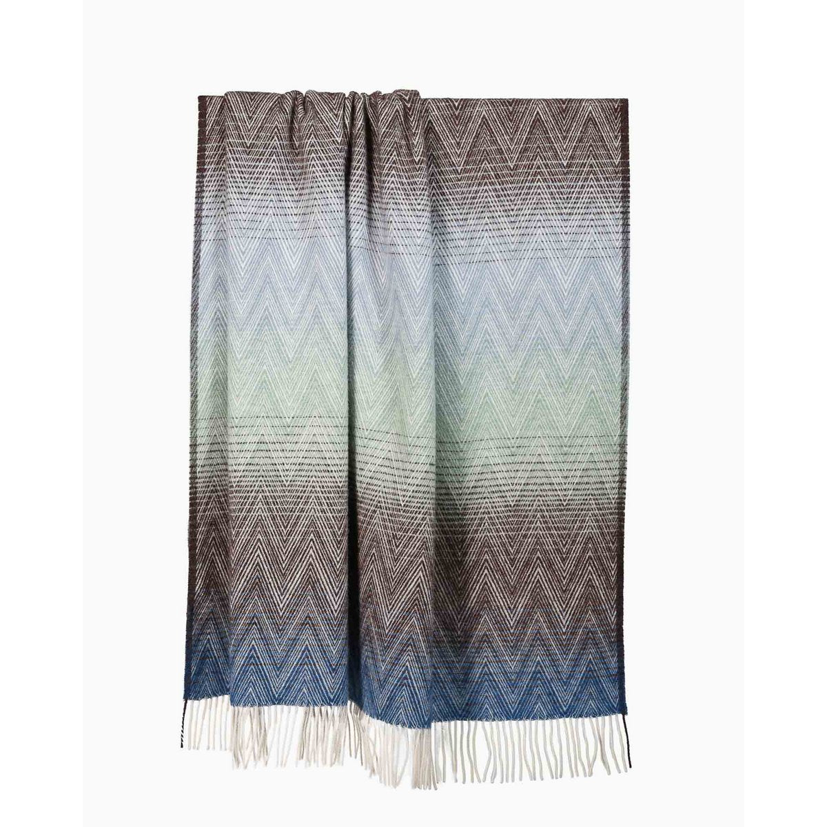 Wool Throw Blanket Manoria Acqua styled in a room setting