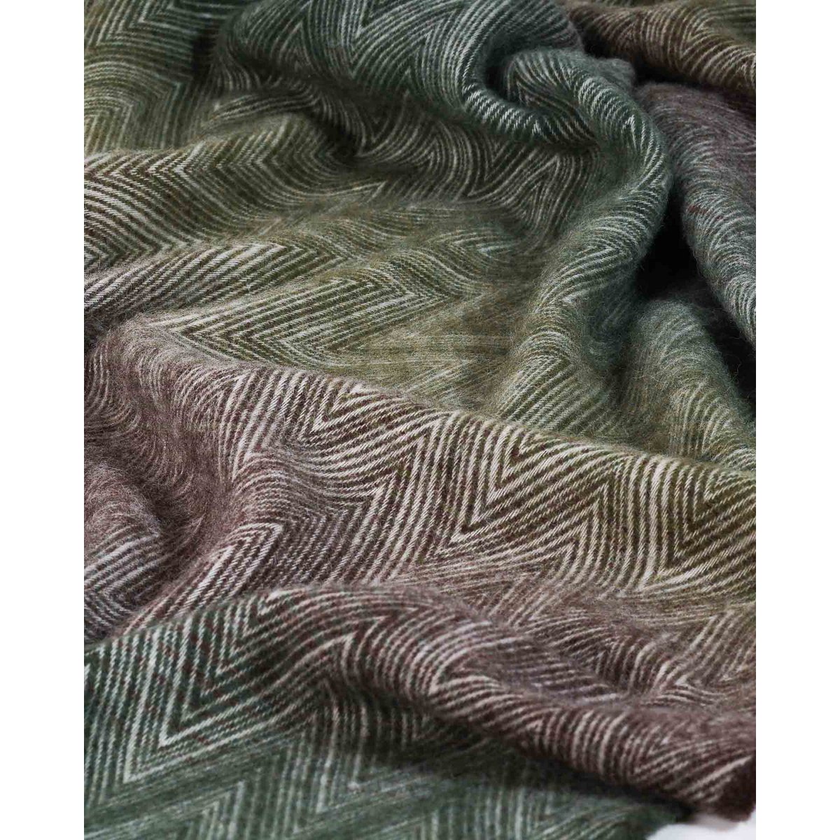 Close-up of Manoria Foresta's woven zigzag wool texture