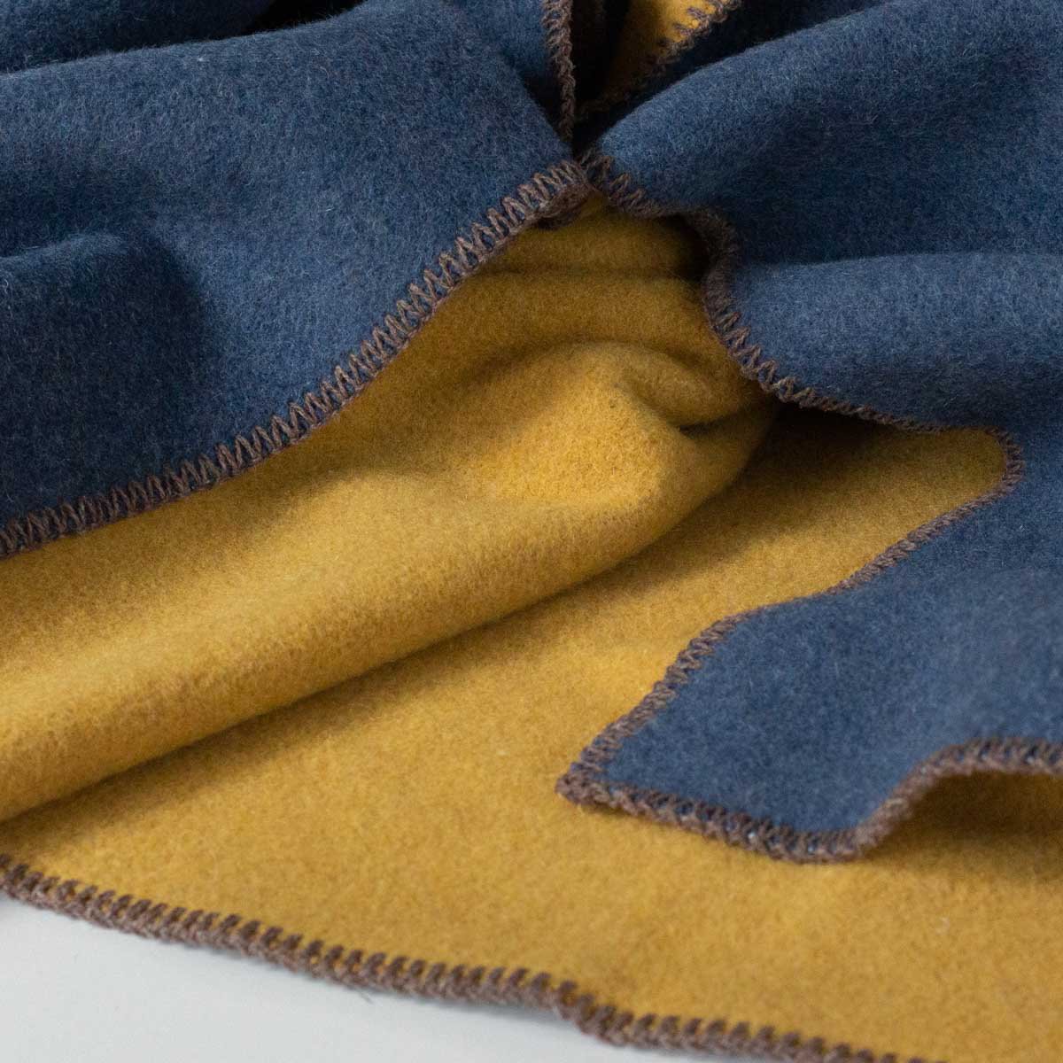 Close-up of Aegean throw's merino wool and nylon blend texture