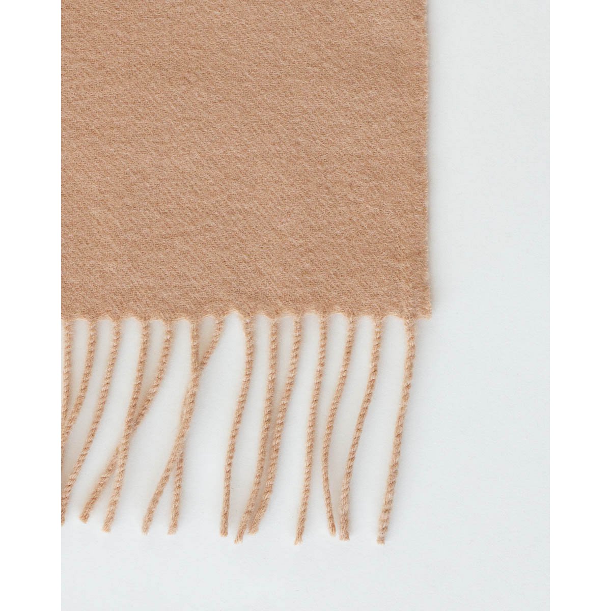 Wool Throw Blanket Rio in beige styled in a room setting