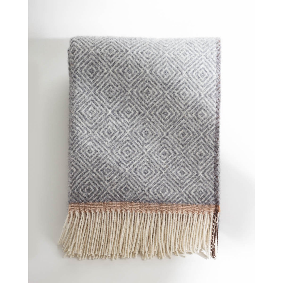 Close-up swatch of Venezia throw's grey diamond weave